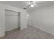 Bright bedroom with tile floors and walk-in closet at 8158 Bucksaw Dr, Orlando, FL 32817