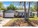 Charming single Gathering home featuring stone accents, a two-car garage, and lovely curb appeal at 8158 Bucksaw Dr, Orlando, FL 32817