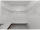 Spacious walk-in closet with built-in shelving at 8158 Bucksaw Dr, Orlando, FL 32817