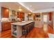 Spacious kitchen island with seating, natural wood accents, and modern appliances at 910 Locust St, New Smyrna Beach, FL 32169