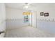 Bright bedroom featuring patterned wallpaper and ceiling fan at 981 Piedmont Oaks Dr, Apopka, FL 32703