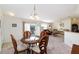 Open floor plan featuring a dining area connecting the living room at 992 Pinewood Pl, The Villages, FL 32162