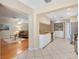 Open-concept kitchen seamlessly connected to the living area with stainless steel appliances at 1037 Willow Dr, Leesburg, FL 34748