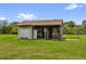 Exterior view of barn on grassy lot at 10901 Island Grove Rd, Clermont, FL 34711