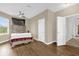 Bedroom with wood floors, neutral paint, and natural light at 10901 Island Grove Rd, Clermont, FL 34711