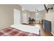 Bedroom with wood floors and open desk area at 10901 Island Grove Rd, Clermont, FL 34711