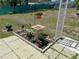 Backyard patio area with a small garden plot and bird bath at 11250 Sw 78Th Ct, Ocala, FL 34476