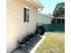 Home exterior features a row of beautiful potted flowers at 11250 Sw 78Th Ct, Ocala, FL 34476