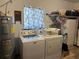 The laundry room features a washer, dryer, and water heater at 11250 Sw 78Th Ct, Ocala, FL 34476
