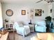 Bright living room with a neutral color scheme and comfortable seating at 11250 Sw 78Th Ct, Ocala, FL 34476