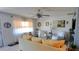 Comfortable living room with a view of the window and bright lighting at 11250 Sw 78Th Ct, Ocala, FL 34476