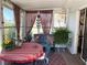 Charming sunroom features lots of windows with lots of natural sunlight at 11250 Sw 78Th Ct, Ocala, FL 34476