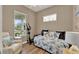 Guest bedroom featuring a day bed, exercise equipment, and ample natural light at 1172 Fiesta Key Cir, Lady Lake, FL 32159
