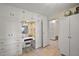 Dressing area with custom storage, built-in vanity and a closet at 1313 Crestview Dr, Mount Dora, FL 32757