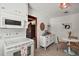 Cozy kitchen with appliances, a breakfast nook and a view into the living area at 1313 Crestview Dr, Mount Dora, FL 32757