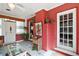 Inviting sunroom featuring neutral tones, tile flooring, and lots of natural light at 1313 Crestview Dr, Mount Dora, FL 32757