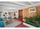 Spacious sunroom with bamboo accent wall and abundant natural lighting at 1313 Crestview Dr, Mount Dora, FL 32757