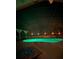 Enjoy a late-night swim in the pool with relaxing lighting, complete with a screened-in enclosure and a fire pit at 13319 Via Roma Cir, Clermont, FL 34711