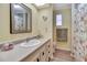 Well-lit bathroom with modern vanity and shower/tub combination at 1401 W Highway 50 # 142, Clermont, FL 34711