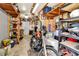 Organized garage with ample storage and a motorcycle at 1401 W Highway 50 # 142, Clermont, FL 34711
