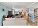 Bright and airy living room featuring a comfortable sofa and modern decor at 1401 W Highway 50 # 142, Clermont, FL 34711