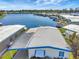 Aerial view showcasing a waterfront community with stunning lake views at 1401 W Highway 50 # 143, Clermont, FL 34711