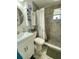 Bathroom featuring tiled walk-in shower, white vanity and toilet for a modern look at 14657 Sw 41St Ave, Ocala, FL 34473