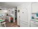 Bright kitchen leading to dining room and bedroom at 150 Hickory Ln, Eustis, FL 32726