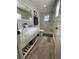 Modern bathroom with double vanity, glass shower, and updated fixtures at 1650 Sundance Dr, St Cloud, FL 34771