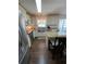 Well-appointed kitchen with stainless steel appliances, granite countertops, and a functional island, perfect for cooking and dining at 1650 Sundance Dr, St Cloud, FL 34771