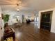 Spacious open living space flows from kitchen to dining and Gathering room, filled with natural light and modern flooring at 1650 Sundance Dr, St Cloud, FL 34771