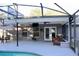 Covered patio overlooking a screened-in pool area, complete with outdoor seating and ample shade at 1650 Sundance Dr, St Cloud, FL 34771
