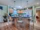 Well-equipped kitchen with a breakfast bar and plenty of cabinet space at 17374 Se 76Th Flintlock Ter, The Villages, FL 32162
