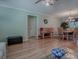Spacious living and dining area with beautiful hardwood floors and stylish decor at 17374 Se 76Th Flintlock Ter, The Villages, FL 32162