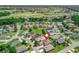 Beautiful aerial view of home in golf course community with nearby green space and golf cart paths at 17787 Se 114Th Ave, Summerfield, FL 34491