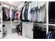 Walk-in closet features custom shelving and ample storage space at 2001 Dagenais Way, The Villages, FL 32163