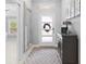 Inviting foyer with modern decor, ample natural light, and a stylish console table sets a welcoming tone at 2001 Dagenais Way, The Villages, FL 32163