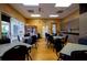 Bright and functional activity room with tables, chairs, and ample counter space at 2126 Burley Ave, Clermont, FL 34711