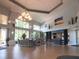 Welcoming lobby area featuring high ceilings, stylish decor, and an abundance of natural light at 2126 Burley Ave, Clermont, FL 34711