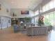 Spacious lobby area with comfortable seating, tasteful decor, and large windows at 2126 Burley Ave, Clermont, FL 34711