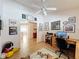 Cozy office space with wood floors, decorated walls and office furniture at 2126 Burley Ave, Clermont, FL 34711