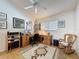 Charming office with wood desk, rocking chair, and decorative accents at 2126 Burley Ave, Clermont, FL 34711