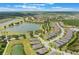 Aerial view of a community featuring a lake, golf course and single Gathering homes at 2129 Palm Tree Dr, Poinciana, FL 34759