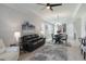 Spacious living room with a comfortable seating area and view to the kitchen at 2129 Palm Tree Dr, Poinciana, FL 34759