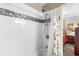 Modern bathroom shower with decorative tile and neutral curtain at 2252 Kent Rd, Deltona, FL 32738