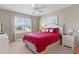 Bright bedroom with a large window and light-colored walls at 2482 Ansley Path, The Villages, FL 32162