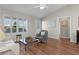 Cozy living room with lots of light coming in from the windows at 2482 Ansley Path, The Villages, FL 32162