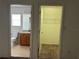 View of a bathroom and a closet, seen through doorways at 25801 Belle Helene, Leesburg, FL 34748