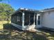 Enclosed patio with plenty of sunlight, perfect for relaxation or entertaining at 25801 Belle Helene, Leesburg, FL 34748