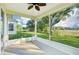 Enclosed sunroom with scenic views of the backyard at 27510 Discover Ct, Leesburg, FL 34748